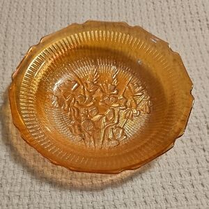 Jeannette Glass Company in the "Iris and Herringbone" pattern.